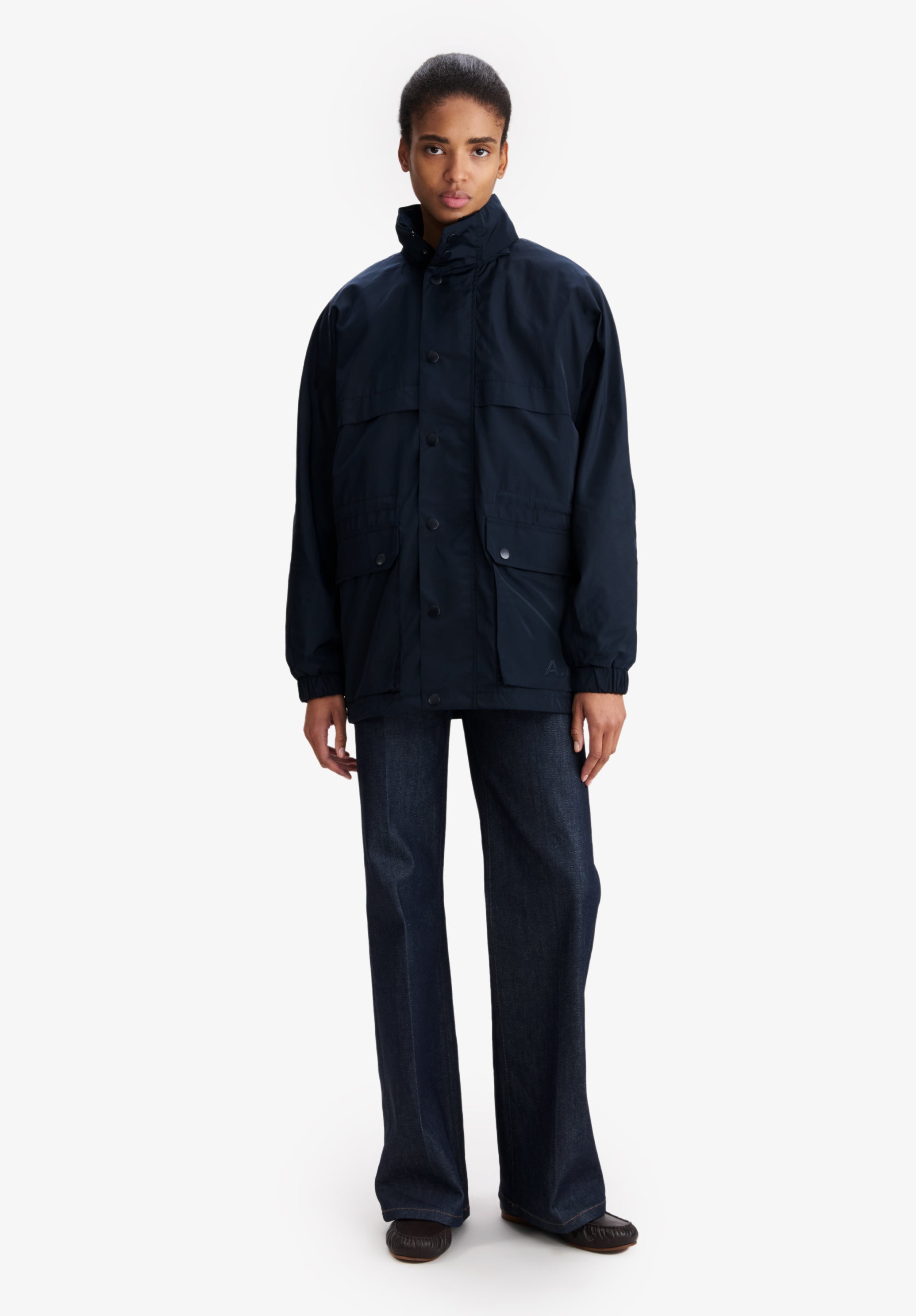 Navy blue windbreaker. - 4