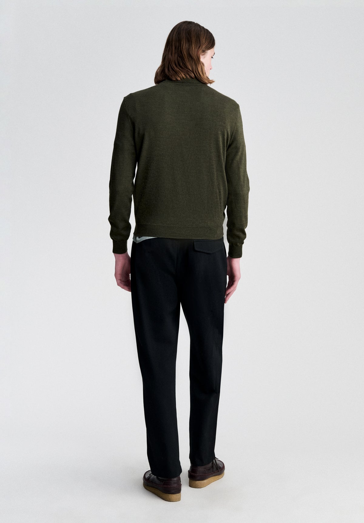 Long-sleeved dark green wool polo shirt