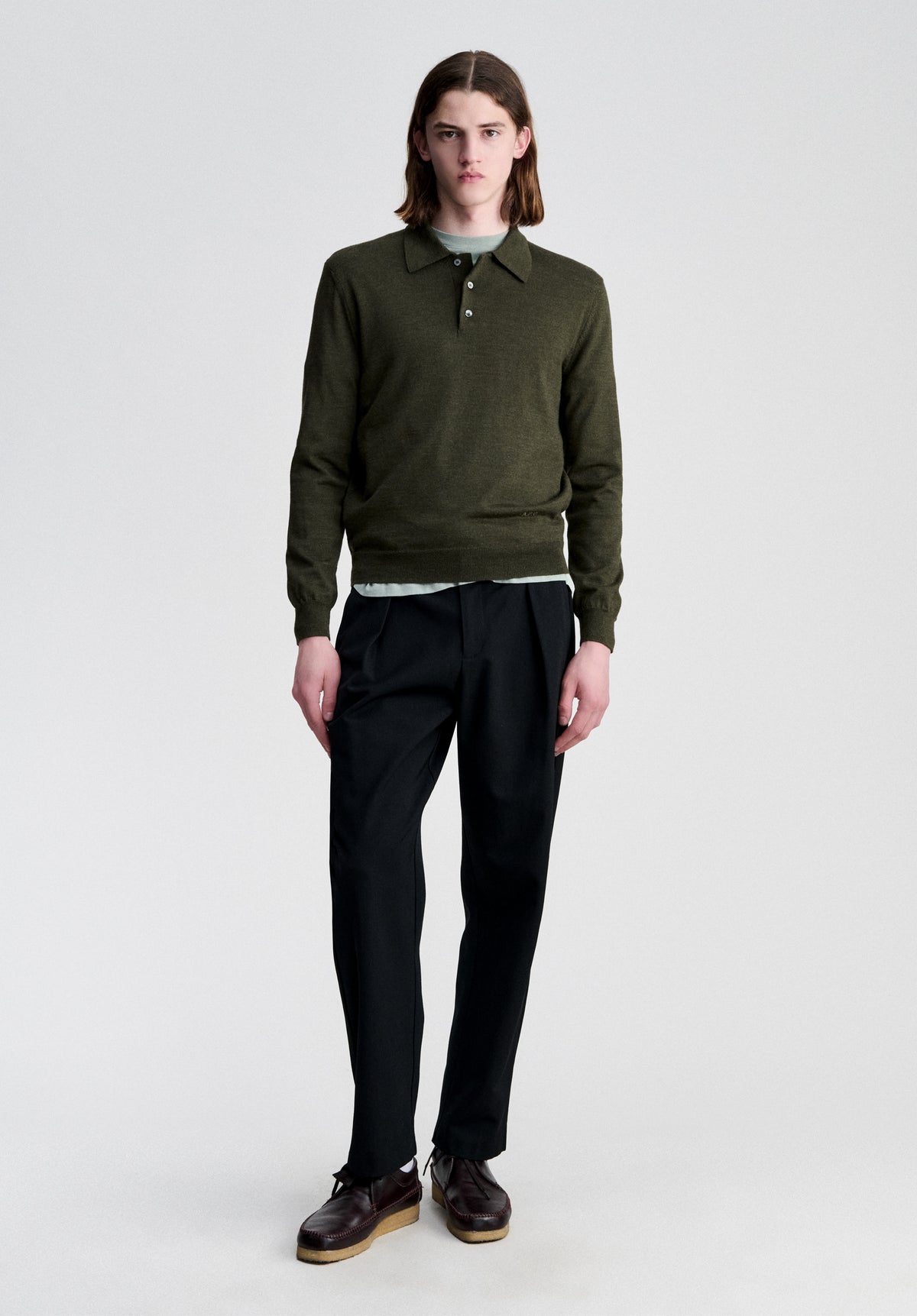 Long-sleeved dark green wool polo shirt